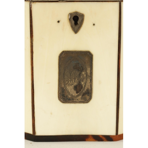 475 - A GEORGIAN PANELLED IVORY AND TORTOISESHELL DECAGONAL ‘TENT TOP’ TEA CADDY with silver axe-drop hand... 