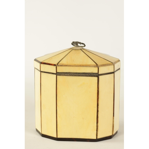 475 - A GEORGIAN PANELLED IVORY AND TORTOISESHELL DECAGONAL ‘TENT TOP’ TEA CADDY with silver axe-drop hand... 