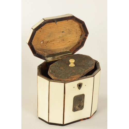 475 - A GEORGIAN PANELLED IVORY AND TORTOISESHELL DECAGONAL ‘TENT TOP’ TEA CADDY with silver axe-drop hand... 