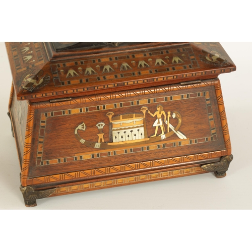 480 - AN EARLY 20TH CENTURY EGYPTIAN STYLE SARCOPHAGUS SHAPED COPPER, BRASS AND PEWTER INLAID WALNUT TEA C... 