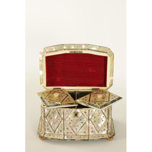 484 - A GOOD 19TH CENTURY MOTHER-OF-PEARL INLAID TEA CADDY the angled lozenge panelled front with contrast... 