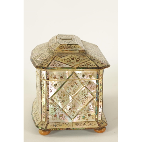 484 - A GOOD 19TH CENTURY MOTHER-OF-PEARL INLAID TEA CADDY the angled lozenge panelled front with contrast... 