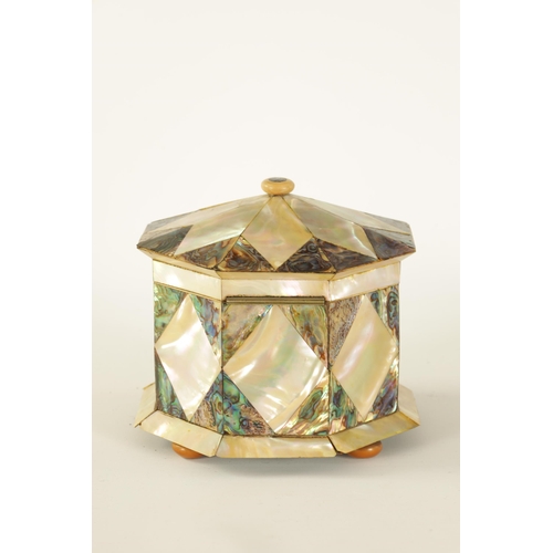 485 - A GOOD 19TH CENTURY OCTAGONAL MOTHER OF PEARL TEA CADDY with segmented contrasting decoration, the s... 