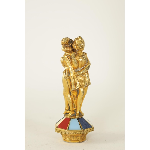 498 - A 19TH CENTURY FRENCH GILT BRONZE SEAL with classical figural handle above a tapering angled base in... 