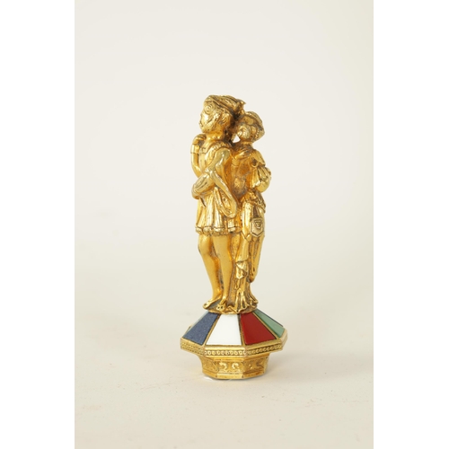 498 - A 19TH CENTURY FRENCH GILT BRONZE SEAL with classical figural handle above a tapering angled base in... 