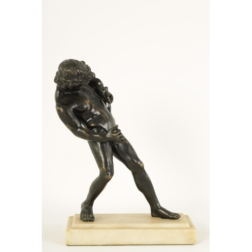 516 - AN EARLY 20TH CENTURY GRAND TOUR BRONZE OF BACCHUS mounted on a moulded white marble plinth base. (2... 