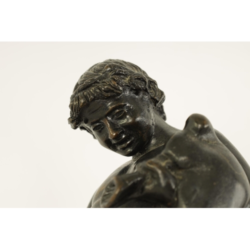 516 - AN EARLY 20TH CENTURY GRAND TOUR BRONZE OF BACCHUS mounted on a moulded white marble plinth base. (2... 