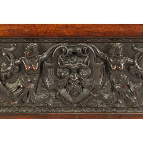 522 - A 19TH CENTURY FRAMED CONTINENTAL CARVED WALNUT PANEL finely carved in high relief with sea serpents... 