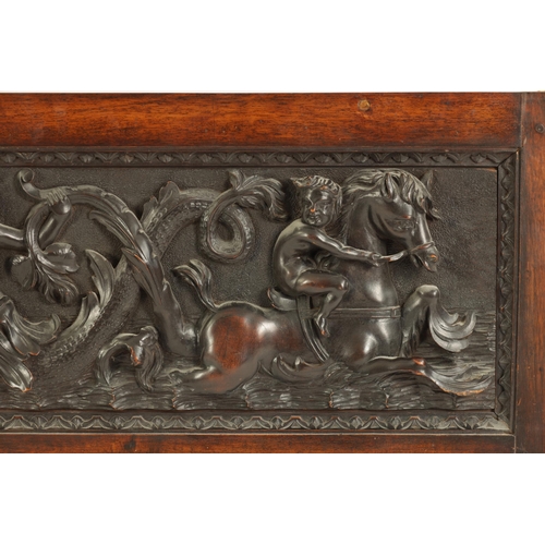 522 - A 19TH CENTURY FRAMED CONTINENTAL CARVED WALNUT PANEL finely carved in high relief with sea serpents... 