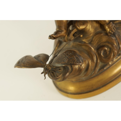 523 - A 19TH CENTURY FRENCH GILT BRONZE SCULPTURE depicting a winged cherub and chariot being drawn by a b... 