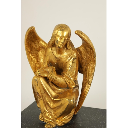 530 - A LATE 19TH CENTURY FRENCH GILT BRONZE SCULPTURE depicting a crouching winged angel, mounted on a la... 