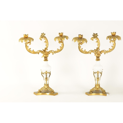 532 - A PAIR OF 19TH CENTURY TWO BRANCH ORMOLU AND OPAQUE GLASS CANDELABRA with leaf cast branchwork arms ... 