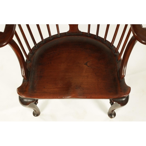 1001 - A GEORGE II MAHOGANY COMB BACK WINDSOR CHAIR with bowed spindle back and vase-shaped centre splat, h... 