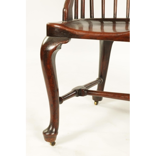 1001 - A GEORGE II MAHOGANY COMB BACK WINDSOR CHAIR with bowed spindle back and vase-shaped centre splat, h... 