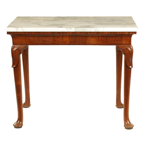 1002 - A GEORGE II WALNUT CONSOLE TABLE the veined Carrera marble top above a rounded short-grained freize ... 