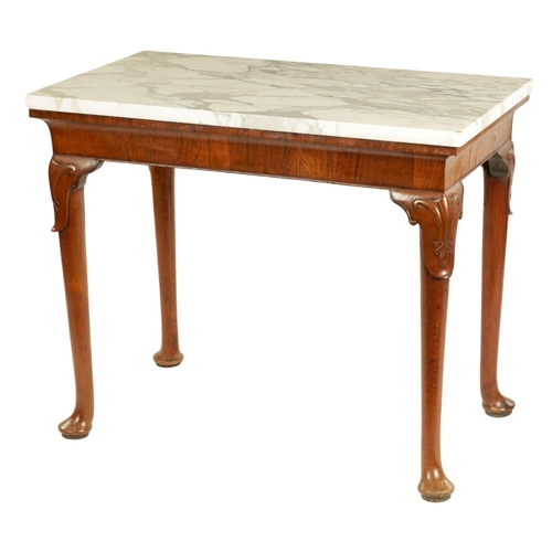 1002 - A GEORGE II WALNUT CONSOLE TABLE the veined Carrera marble top above a rounded short-grained freize ... 