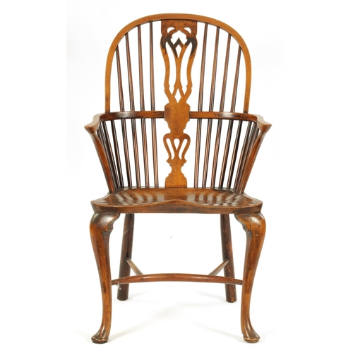 993 - AN 18TH CENTURY ASH AND ELM CABRIOLE LEG WINDSOR CHAIR with hoop back enclosing a full length pierce... 