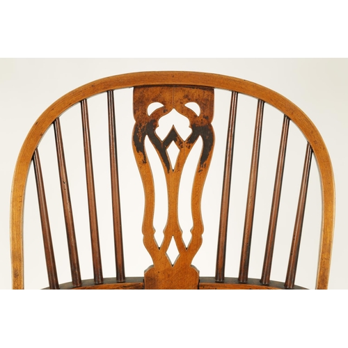 993 - AN 18TH CENTURY ASH AND ELM CABRIOLE LEG WINDSOR CHAIR with hoop back enclosing a full length pierce... 