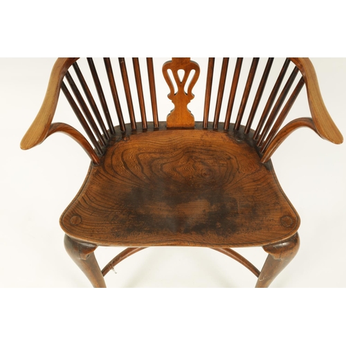 993 - AN 18TH CENTURY ASH AND ELM CABRIOLE LEG WINDSOR CHAIR with hoop back enclosing a full length pierce... 