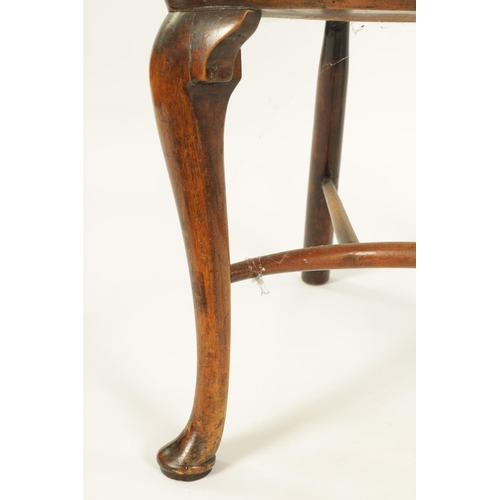 993 - AN 18TH CENTURY ASH AND ELM CABRIOLE LEG WINDSOR CHAIR with hoop back enclosing a full length pierce... 