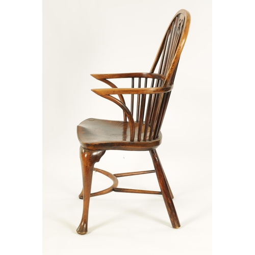 993 - AN 18TH CENTURY ASH AND ELM CABRIOLE LEG WINDSOR CHAIR with hoop back enclosing a full length pierce... 