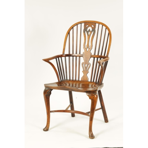 993 - AN 18TH CENTURY ASH AND ELM CABRIOLE LEG WINDSOR CHAIR with hoop back enclosing a full length pierce... 