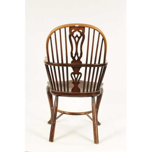 993 - AN 18TH CENTURY ASH AND ELM CABRIOLE LEG WINDSOR CHAIR with hoop back enclosing a full length pierce... 