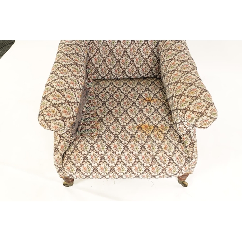 997 - HOWARD AND SONS. A 19TH CENTURY WALNUT FRAMED UPHOLSTERED ARMCHAIR with butttoned back and raised ar... 