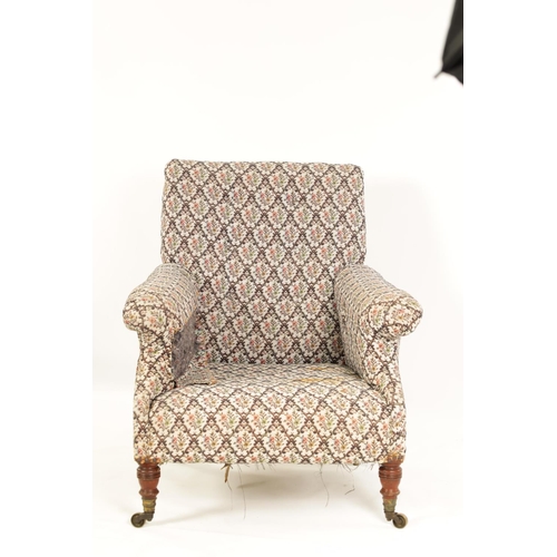 997 - HOWARD AND SONS. A 19TH CENTURY WALNUT FRAMED UPHOLSTERED ARMCHAIR with butttoned back and raised ar... 