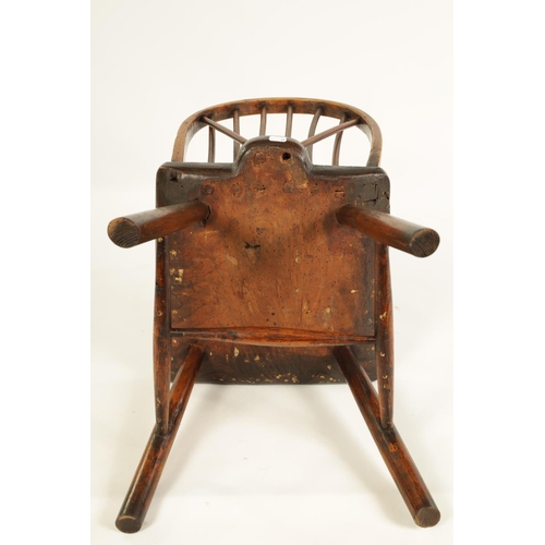 999 - AN 18TH CENTURY PRIMITIVE ASH AND ELM STICK BACK CHILD'S CHAIR with hooped stick back and splayed le... 