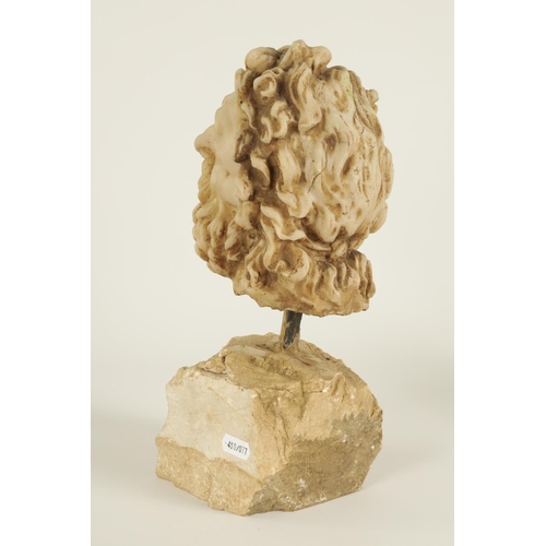 535 - AN EARLY CARVED CARRERA MARBLE HEAD OF A CLASSICAL BEARDED GENTLEMAN on plinth base. (31cm high over... 