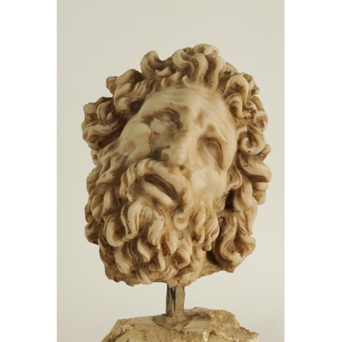 535 - AN EARLY CARVED CARRERA MARBLE HEAD OF A CLASSICAL BEARDED GENTLEMAN on plinth base. (31cm high over... 