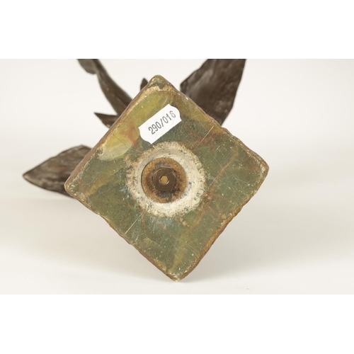 536 - AN UNUSUAL LATE 19TH CENTURY BRONZE SCULPTURE OF A FLYING FISH mounted on a tapering green onyx plin... 