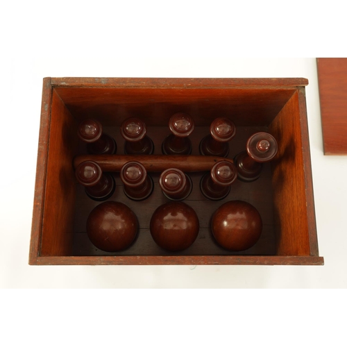 542 - A GOOD 19TH CENTURY MAHOGANY CASED SET OF TURNED TREENWARE INDOOR SKITTLES of ringed turned form com... 