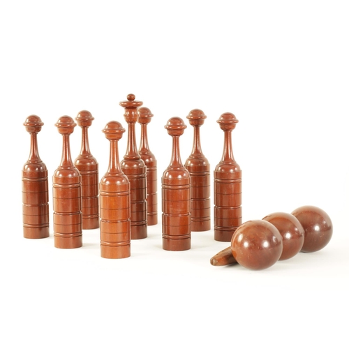 542 - A GOOD 19TH CENTURY MAHOGANY CASED SET OF TURNED TREENWARE INDOOR SKITTLES of ringed turned form com... 