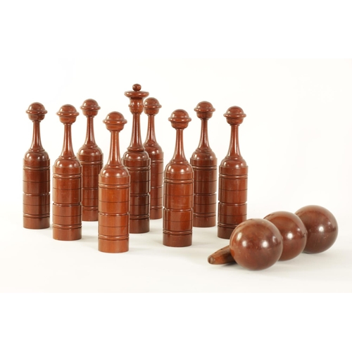 542 - A GOOD 19TH CENTURY MAHOGANY CASED SET OF TURNED TREENWARE INDOOR SKITTLES of ringed turned form com... 