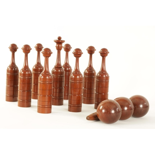 542 - A GOOD 19TH CENTURY MAHOGANY CASED SET OF TURNED TREENWARE INDOOR SKITTLES of ringed turned form com... 