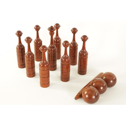 542 - A GOOD 19TH CENTURY MAHOGANY CASED SET OF TURNED TREENWARE INDOOR SKITTLES of ringed turned form com... 