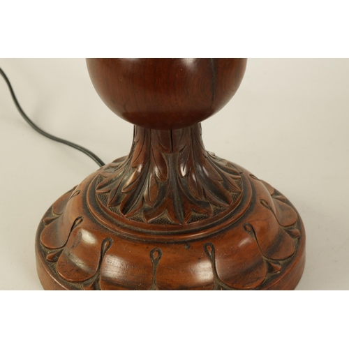 546 - A STYLISH EARLY 20TH CENTURY AESTHETIC CARVED WALNUT AND EBONISED TABLE LAMP MODELLED AS AN ELEPHANT... 