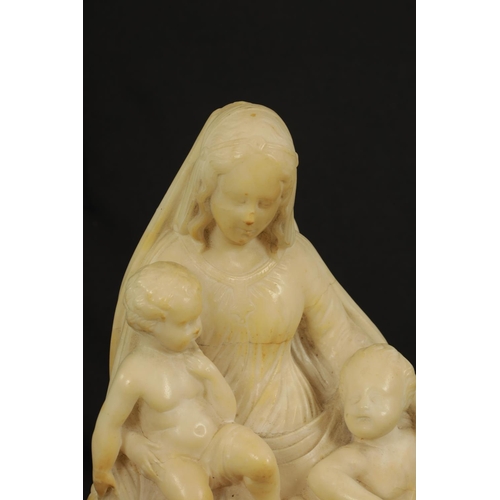 547 - AN 18TH/19TH CENTURY CARVED ALABASTER FIGURE depiciting a female with two children - bears Christies... 