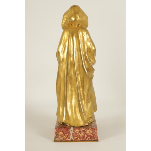 551 - E BERNOUD AN ART NOUVEAU FRENCH GILT BRONZE AND IVORY FIGURAL BRONZE depiciting a Dutch girl wearing... 