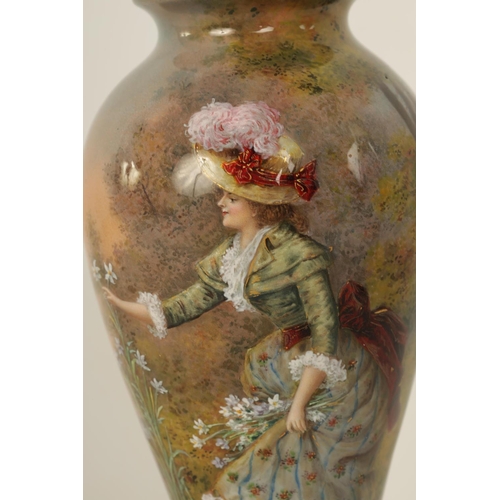 560 - A LATE 19TH CENTURY FRENCH LIMOGES ENAMEL VASE of inverted baluster form depicting a lady picking fl... 