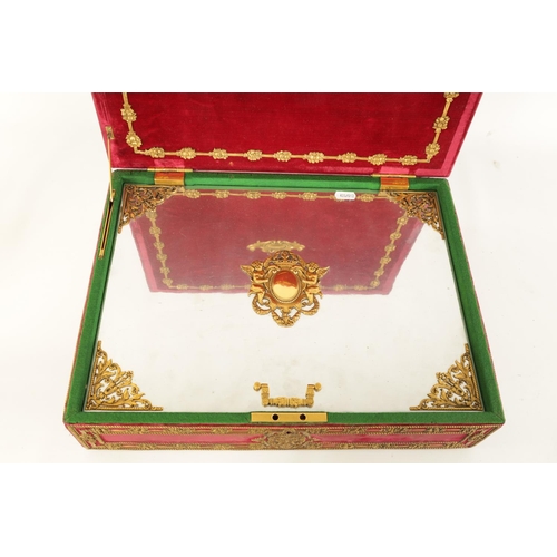 564 - AN AMERICAN ORMOLU-MOUNTED, RED VELVET AND CHROME HUMIDOR BY EDWARD F. CALDWELL & CO. NEW YORK of re... 