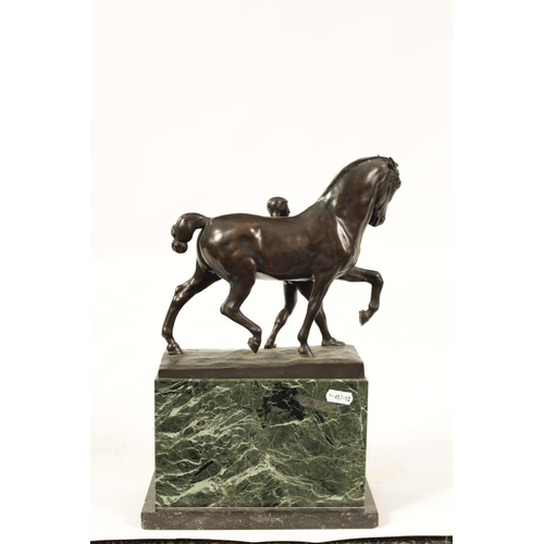 569 - RUDOLPH KAESBACH (1873 - 1950) AN EARLY 20TH CENTURY PATINATED BRONZE SCULPTURE OF A MAN AND HORSE m... 