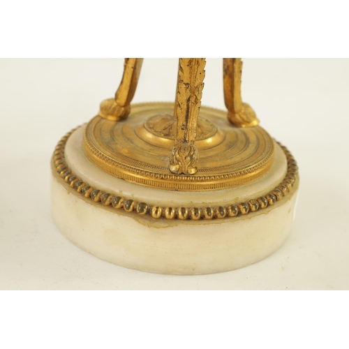 573 - A PAIR OF 19TH CENTURY ADAM STYLE ORMOLU MOUNTED WHITE MARBLE REVERSIBLE URNS/CANDLESTICKS the domed... 