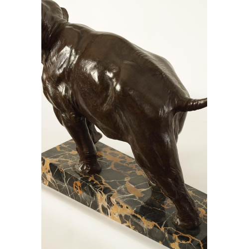 578 - A FRENCH ART DECO BRONZE SCULPTURE OF AN ELEPHANT mounted on a angled back marble base - stamped Bro... 