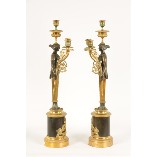 582 - A PAIR OF LATE 19TH CENTURY BRONZE AND ORMOLU FRENCH EMPIRE STYLE THREE BRANCH FIGURAL CANDELABRA wi... 