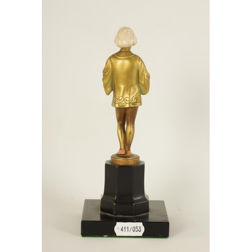 585 - FERDINAND PREISS (1882-1943). AN ART DECO GILT BRONZE AND IVORY FIGURE depicting a young boy holding... 