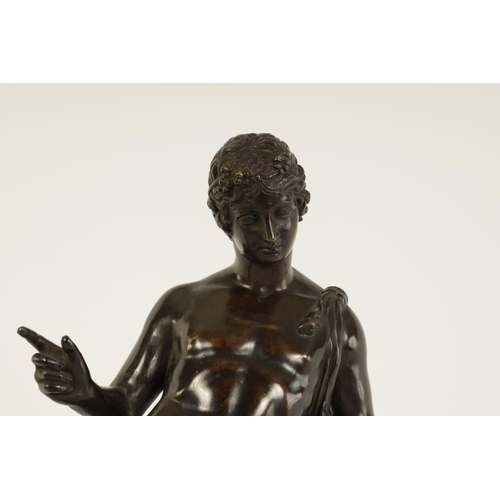 586 - A 19TH CENTURY PATINATED BRONZE SCULPTURE OF A SEMI NUDE CLASSICAL MALE FIGURE mounted on a veined b... 