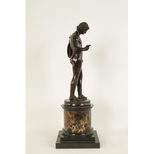 586 - A 19TH CENTURY PATINATED BRONZE SCULPTURE OF A SEMI NUDE CLASSICAL MALE FIGURE mounted on a veined b... 